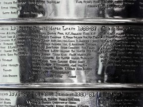 Names of the 1967 Stanley Cup winning Toronto Maple Leafs are edged in the famed trophy at Toronto's Hockey Hall Of Fame, Friday March 9, 2012.(Peter J. Thompson/National Post)