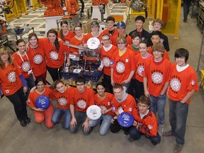 Members of the Sandwich Secondary School robotics team pose Thursday, Feb. 14, 2013, for a group photo at the Centerline Tool facility in Windsor, Ont.  (DAN JANISSE/The Windsor Star)