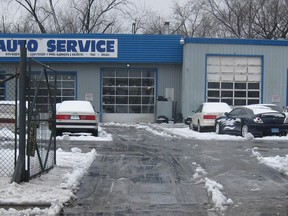 An image taken in front of a business on Crawford Avenue in Windsor, Ont. shows snow that has been pushed from the property into the roadway. Photographed Feb. 27, 2013. (Joe Ruccolo / Special to The Windsor Star)