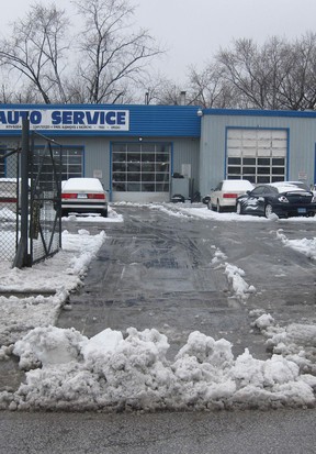 An image taken in front of a business on Crawford Avenue in Windsor, Ont. shows snow that has been pushed from the property into the roadway. Photographed Feb. 27, 2013. (Joe Ruccolo / Special to The Windsor Star)