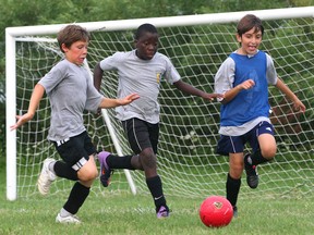 Files: Christian Wnersh, left,  Sosa Emovan and Eray Yilmaz practice with the Ciaciaro Under-10 soccer team Aug 4, 2010.  (Windsor Star files)