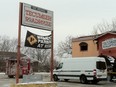 Fire investigators continue to study the Tecumseh Roadhouse on Feb. 5, 2013. A blaze causing an estimated $500,000 worth of damage broke out at the business the night before. (Dalson Chen / The Windsor Star)