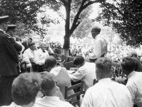 This July 20, 1925 photo shows William Jennings Bryan, seated at left, being interrogated by attorney Clarence Seward Darrow during the trial of State of Tennessee vs. John Thomas Scopes in Dayton, Tenn. Scopes was tried and convicted for violating a state law prohibiting the teaching of the theory of evolution. It was quickly dubbed "The Monkey Trial," a description the town still dislikes, and for a couple of weeks the world was focused on conservative backwater Dayton, population about 3,000, which was flooded with some 200 journalists from around the world, scores of telegraph operators, thousands of onlookers and some of the finest legal talent in America. It was the first American trial to be broadcast live nationally on the radio. (AP Photo/Smithsonian Institution)