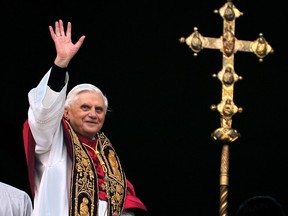 This April 19, 2005 file photo shows Pope Benedict XVI greeting the crowd from the central balcony of St. Peter's Basilica moments after being elected, at the Vatican. On Monday, Feb. 11, 2013 Benedict XVI announced he would resign Feb. 28, the first pontiff to do so in nearly 600 years. The decision sets the stage for a conclave to elect a new pope before the end of March. (AP Photo/Domenico Stinellis/FILE)