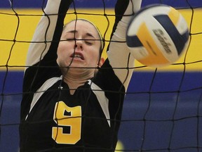 General Amherst's Christine Belcher blocks a spike during WECSSAA girls volleyball action earlier this season. The Generals beat the Essex Red Raiders 3-0 in the WECSSAA AA final Feb. 21. 2013.  (Windsor Star files)