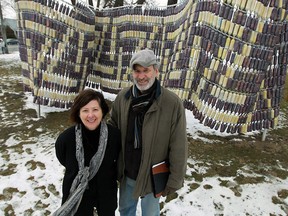 Windsor artists Phil McLeod (R) and Lorraine Steele (L) with their War of 1812 Peace Wampum Belt. Photographed Feb. 26, 2012. (Tyler Brownbridge / The Windsor Star)