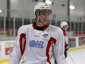 Windsor Spitfires Kerby Rychel prepares for a long road trip with teammates at WFCU. (NICK BRANCACCIO/The Windsor Star)