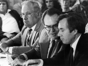 Federal cabinet ministers Eugene Whelan, left, Herb Gray and Mark MacGuigan meet with executives of UAW Local 444 in Windsor in this Oct. 12, 1981 file photo. (Windsor Star files)