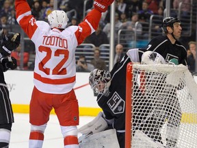 Detroit's Jordin Tootoo, left, celebrates a goal by defenceman Kyle Quincey  during NHL action Wednesday, Feb. 27, 2013, in Los Angeles.  (AP Photo/Mark J. Terrill)