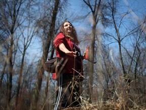 Karen Stephenson, left, leads a small group on an Edible Walk 'n' Talk, pointing out and explaining which plants are edible while at Ojibway Park, Saturday, March 30, 2013.  (DAX MELMER/The Windsor Star)