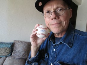 Tim Simpson, a former Windsor Star employee and lifelong Detroit Tigers fan, is battling terminal cancer. He says the gift of a signed Justin Verlander baseball from Tigers GM Dave Dombrowski brought him true happiness. (Courtesy of Tim Simpson)