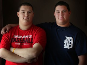 Twins Jake, left, and Josh Robert are closer than ever these days. Jake was recently diagnosed with severe aplastic anemia, a rare life-threatening disease, but will receive a bone marrow transplant from identical twin Josh. (DAX MELMER/The Windsor Star)