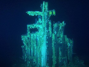 This image provided by Bezos Expeditions shows growths on a Saturn V rocket stage structure on the bottom of the Atlantic Ocean in March 2013. An expedition led by Amazon CEO Jeff Bezos pulled up two rocket engines that helped boost Apollo astronauts to the moon. Bezos and NASA announced the recovery on Wednesday, March 19, 2013. The sunken engines were part of the Saturn V rocket used to bring astronauts to the moon during the 1960s and 1970s. After liftoff, they fell into the ocean as planned. (AP Photo/Bezos Expeditions)