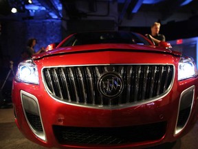 The new 2014 Buick Regal GS is displayed at a launch party for new versions of General Motors Company (GM) Buick brand cars on March 26, 2013 in New York City. The new Regal features a more refined turbo engine along with the introduction of all-wheel drive. GM released two new versions of the Regal midsize sports sedan and the LaCrosse large luxury car that the car company hopes will appeal to younger drivers. The New York International Auto Show opens to the media Wednesday.  (Photo by Spencer Platt/Getty Images)