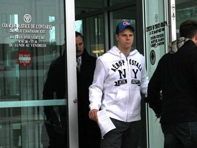 Windsor Spitfire Ben Johnson leaves the Ontario Court of Justice building in Windsor on March 19, 2013. Johnson was released on bail after being charged with two counts of sexual assault. (Jason Kryk/The Windsor Star)