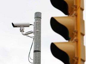 A traffic camera keeps watch over the intersection of Ouellette Avenue and Tecumseh Road in Windsor, Ont. in this file photo.  (TYLER BROWNBRIDGE / The Windsor Star)