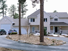 The home of Tom Clements the executive director of the Colorado Department of Corrections is pictured near Monument, Colo., on Wednesday, March 20, 2013. Clements was shot and killed at the front door to the house Tuesday night.(AP Photo/Ed Andrieski)