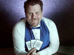 Chris Page is pictured with his storytelling game, Winvention, Monday, March 11, 2013, which will be pitched to the Dragon's Den March 30, 2013.  The game is described as a storytelling game using cards as a catalyst to create inventions.  (DAX MELMER/The Windsor Star)