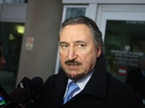 Patrick Ducharme, defence lawyer for Windsor Spitfires Ben Johnson, who is charged with two counts of sexual assault, speaks with the media outside of the Ontario Court of Justice, Monday, March 18, 2013. (DAX MELMER/The Windsor Star)