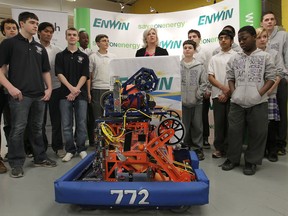 ENWIN Utilities Inc. held a news conference Friday, Mar. 8, 2013, at the Assumption High School in Windsor, Ont. announcing funding robotics designing teams in high school. Barbara Pierce Marshall speaks during the event surrounded by local students. (DAN JANISSE/The Windsor Star)