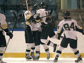 Members of the LaSalle Vipers celebrate a first-period goal against  Strathroy in Game 3 of their Jr. B playoff series at the Vollmer Centre in LaSalle  Sunday, March 3, 2013.   (DAX MELMER/The Windsor Star)