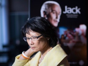 Olivia Chow pauses before chatting with a television crew at a reception for the made-for-television movie "Jack," about late New Democratic Party Leader Jack Layton in Toronto on Monday March 4, 2013. THE CANADIAN PRESS/Chris Young