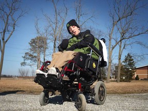 Joe Chauvin, 17, is pictured at his home in Stoney Point, Monday, March 14, 2013.  Chauvin, who suffers from cerebral palsy, will have his funding cut when he turns 18.  The funding provides Chauvin with a support worker 2 times a week.  (DAX MELMER/The Windsor Star)