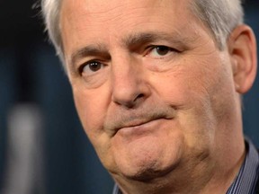 Liberal MP Marc Garneau speaks during a press conference on Parliament Hill in Ottawa on Wednesday, March 13, 2013 to announce his withdrawal from the Liberal leadership race. (THE CANADIAN PRESS/Sean Kilpatrick)