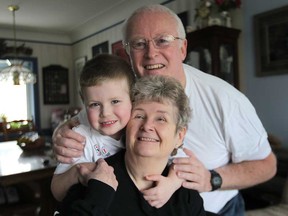 Bob and Lynda Pope pose with their grandson Liam Brigden, 3, at their Windsor, Ont. home on March 26, 2013. They will all be participating in the upcoming MS Walk scheduled for  May 5. (DAN JANISSE/The Windsor Star)