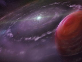 An artist's rendering of the planetary system HR 8799 at an early stage in its evolution, showing the planet HR 8799c, right, as well as a disk of gas and dust, and interior planets.