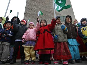 Children from Windsor's Pakistan community wave the Pakistan flag as they sing the national anthems of Canada and Pakistan at a Pakistan Day celebration at city hall in March 2013. Veteran Nadine Murphy says Canada is one of few countries in the world where everyone's rights and beliefs are honoured, but wonders why our relationship with native Canadians is in crisis.  (DAX MELMER/The Windsor Star)