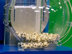 Powerball numbers are chosen in this file photo. (AP Photo/Phil Sears)