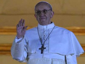 Argentina's Jorge Bergoglio, elected Pope Francis I appears at the window of St Peter's Basilica's balcony after being elected the 266th pope of the Roman Catholic Church on March 13, 2013 at the Vatican.  (AFP PHOTO / VINCENZO PINTOVINCENZO PINTO,VINCENZO PINTO/AFP/Getty Images)