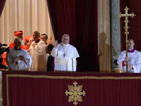 New Pope, Argentinian cardinal Jorge Mario Bergoglio appears at the window of St Peter's Basilica's balcony after being elected the 266th pope of the Roman Catholic Church on March 13, 2013 at the Vatican.  (AFP PHOTO / FILIPPO MONTEFORTEFILIPPO MONTEFORTE,FILIPPO MONTEFORTE/AFP/Getty Images)