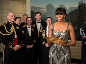 In this handout provided by The White House, First lady Michelle Obama announces the Best Picture Oscar to Argo for the 85th Annual Academy Awards live from the Diplomatic Room of the White House February 24, 2012 in Washington, DC. Obama revealed the award via satellite for the live show being held in Los Angeles. (Photo by Pete Souza/The White House via Getty Images)