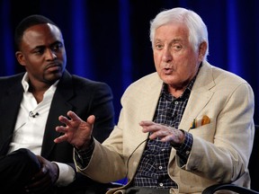 Actor and comedian Wayne Brady, left, looks on as television game show host Monty Hall answers a question about the new "Let's Make A Deal" game show at the CBS Summer Press Tour in Pasadena, Calif. on Monday, August 3, 2009. It's been 50 years since Hall first started asking people if they wanted what was behind Door No. 1, Door No. 2 or Door No. 3.The Canadian-born host returns to "Let's Make a Deal" Friday (shown on City and CBS) to celebrate the incredible TV milestone.THE CANADIAN PRESS/AP/Dan Steinberg