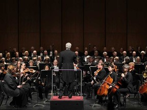 Guest conductor Ivars Taurins, centre, conducts the 'Gloria' show, part of the Windsor Symphony Orchestra's Masterworks at the Capitol Theatre, Saturday, March 23, 2013.  (DAX MELMER/The Windsor Star)