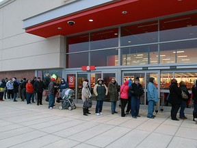 A small crowd gathers outside of the new Target store in Windsor on Tuesday, March 19, 2013. Target opened it's first Windsor store to the public at 8 a.m. (TYLER BROWNBRIDGE/The Windsor Star)