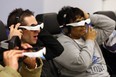 Students wear 3-D glasses and headphones during a training session at the World Class Manufacturing Academy in Warren, Michigan on Friday, March 1, 2013. Employees from across the Chrysler company come to the facility to train and work on real world problems.                   (TYLER BROWNBRIDGE / The Windsor Star)