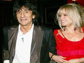 Ron and Jo Wood are shown in a 2006 photo.
(Photograph by: Evan Agostini , Getty Images)