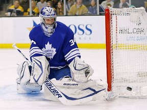 Toronto goalie James Reimer makes a pad save against the Boston Bruins Monday at TD Garden in Boston. (Photo by Jared Wickerham/Getty Images)