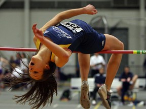 University of Windsor's Jasmin Kerr competes in the women's high jump at the OUA Track and Field meet at the St. Denis Centre. (TYLER BROWNBRIDGE/The Windsor Star)