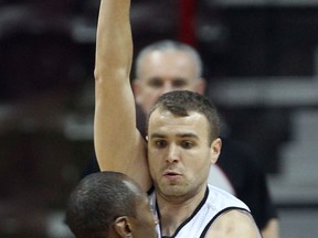 Windsor's Greg Surmacz, right, guards London's Elvin Mims at the WFCU Centre. (NICK BRANCACCIO/The Windsor Star)