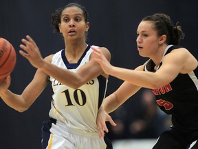 University of Windsor's Miah-Marie Langlois, left, is pressured by Carleton's Alyson Bush at the St. Denis Centre. (DAN JANISSE/The Windsor Star)