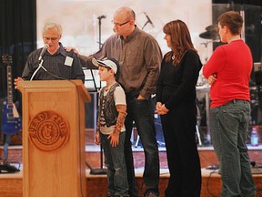 AMHERSTBURG, ONT., Saturday, March 2, 2013 -- Pat Greenwood, left, gives a brief speech with family members at his side during a fundraiser for the families of the victims of the tragic crash on I-75 in Detroit on Jan. 31. Greenwood's granddaughter, Gabrielle, 9, was one of the children who died in the crash, along with her seven-year-old stepbrother, Adan Hicks. The fundraiser was held at the Verdi Club in Amherstburg on Saturday, March 2, 2013.  (REBECCA WRIGHT/ The Windsor Star)