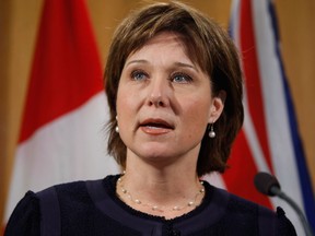 B.C. Premier Christy Clark speaks to media following  a report by Deputy Premier John Dyble in Victoria, B.C.,, on March 14, 2013. (Chad Hipolito/The Canadian Press)