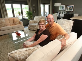 Jon and Shirley Hitchcock, at  their Amherstburg home., have moved to the area to retire after living in Toronto,. (Windsor Star / DAN JANISSE)