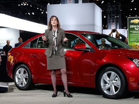 Cristi Landy, marketing director Chevrolet Small Cars unveils the 2014 Chevrolet Cruze Diesel at the Chicago Auto Show on Feb. 7, 2013, in Chicago. The diesel-powered Cruze will be available in Canada this summer. (Charles Rex Arbogast / The Associated Press)