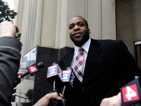 Former Detroit Mayor Kwame Kilpatrick leaves federal court after being convicted Monday, March 11, 2013, in Detroit, of corruption charges, ensuring a return to prison for a man once among the nation's youngest big-city leaders. (AP Photo/Detroit News, David Coates)