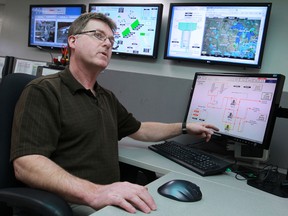 Wayne White, production supervisor, turns off the flow of fluoride into the drinking water in the control room at the A.H. Weeks Water Treatment Plant, Monday, March 25th, 2013.  (DAX MELMER/The Windsor Star)